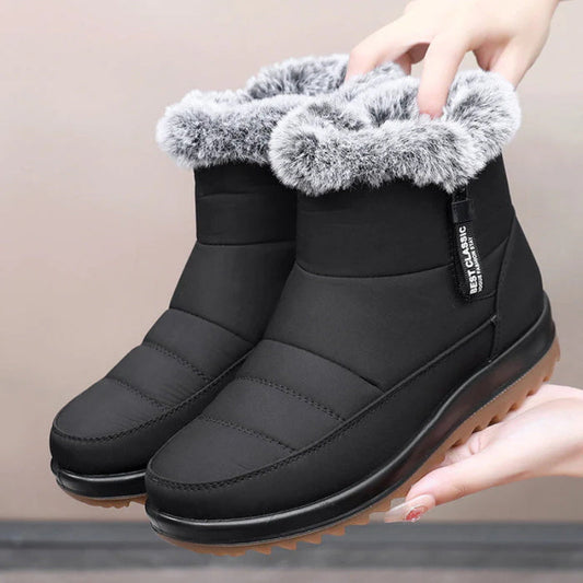 Winterfeindliche warme Baumwollstiefel der Frauen winterfest