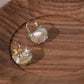 Elegante Gold - Ohrringe mit Edelsteinen und Kristallen verziert