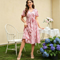 Damenkleid mit Print, Schnürung an der Taille und Rüschenärmeln