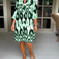 Plissee-Kleid mit Fleckenmuster